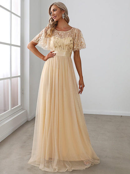 Robe longue de cérémonie à manches courtes avec broderie