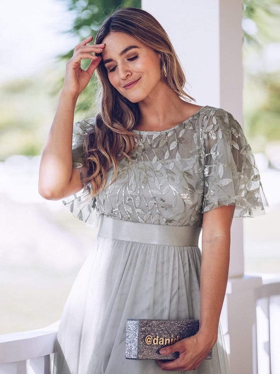 Robe longue de cérémonie à manches courtes avec broderie