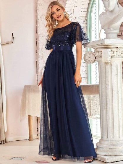 Robe longue de cérémonie à manches courtes avec broderie