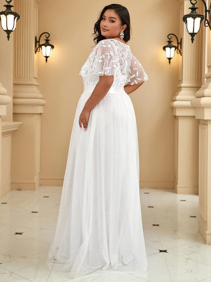Robe longue de cérémonie à manches courtes avec broderie