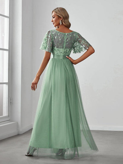 Robe longue de cérémonie à manches courtes avec broderie