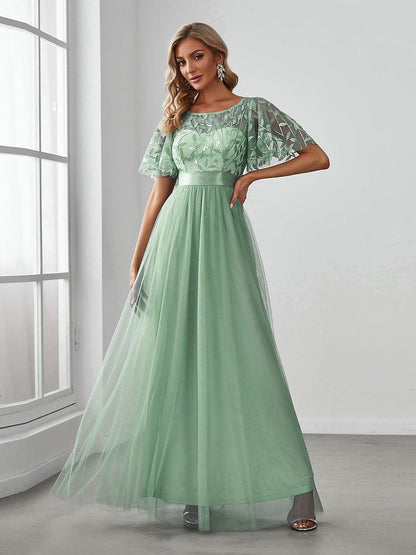 Robe longue de cérémonie à manches courtes avec broderie